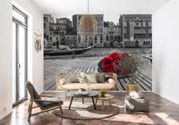 Grey Venice canal wall mural with red roses brightening an open-plan Living area, GD9751