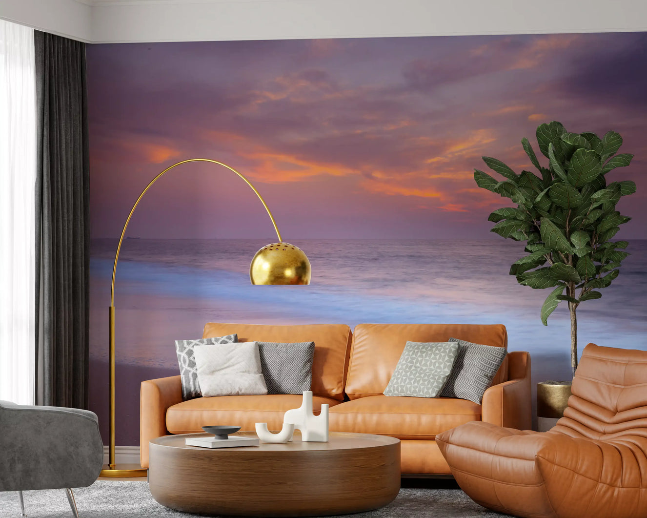 Warm orange and purple beach wall mural featured in a living room