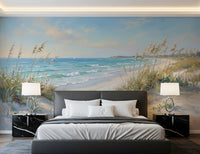 Soft beach wall mural used as a wide accent wall in a bright bedroom.