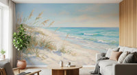 Soft watercolour beach wall mural with sage-green sea-grass and golden reeds.
