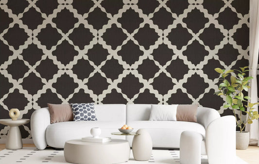 Dark brown trellis geometric wallpaper on living room accent wall with cream lattice detail