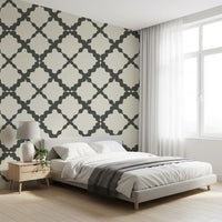 Two-tone geometric lattice trellis wallpaper in grey and cream.