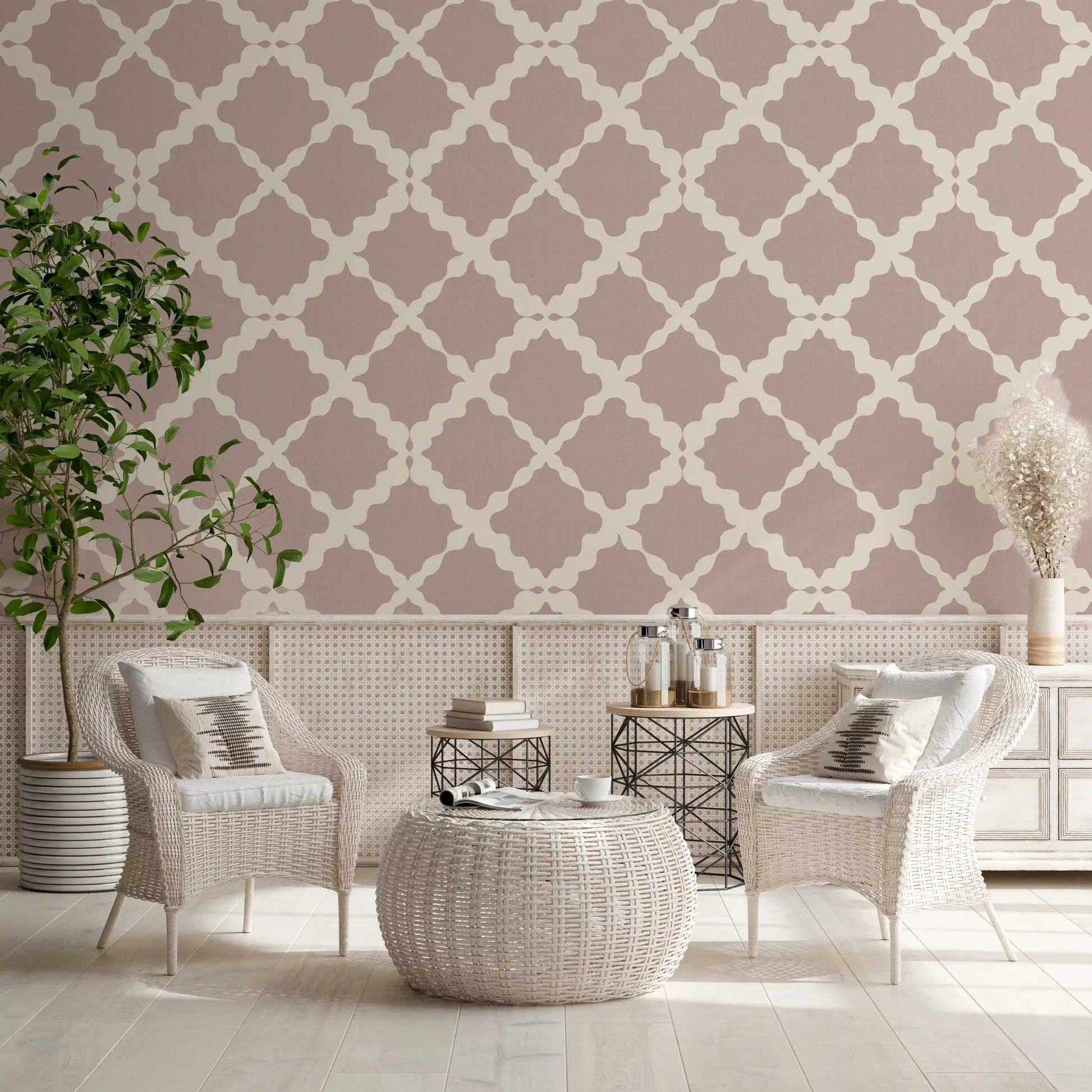 Geometric trellis wallpaper in dusty rose and cream featured in an reading area.