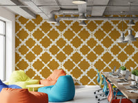 Mustard geometric lattice trellis wallpaper with cream ogee pattern in office.