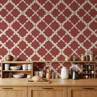 Rust red trellis wallpaper on an kitchen wall with cream geometric lattice design