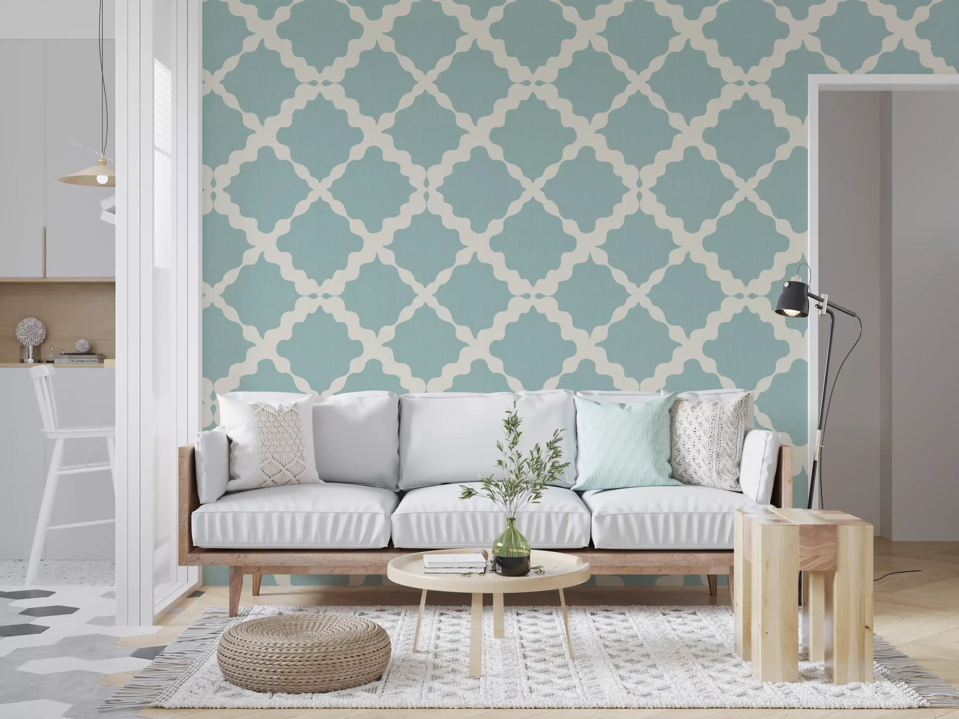 Large-scale ogee trellis wallpaper in dusty teal blue and cream on hallway background.
