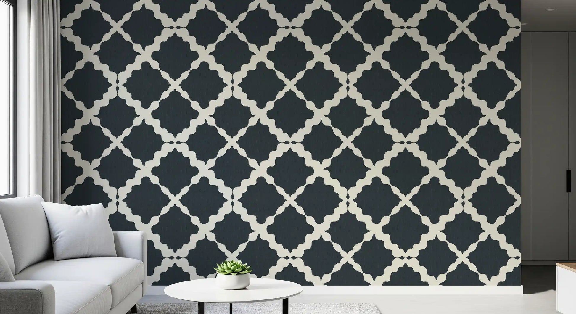 Interlocking curved Moroccan lattice motif in charcoal and cream wallpaper.