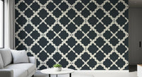 Interlocking curved Moroccan lattice motif in charcoal and cream wallpaper.
