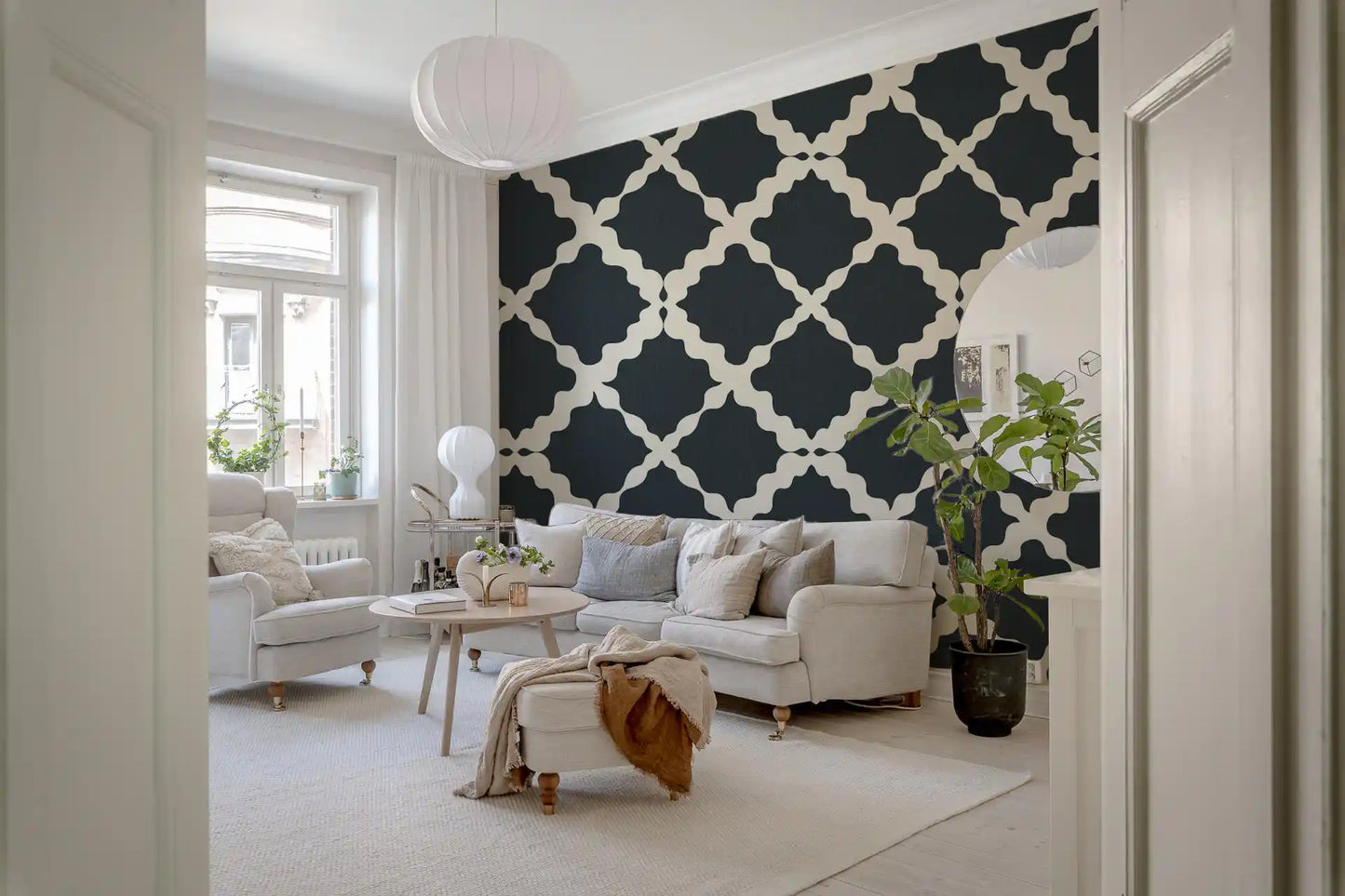 Repeating Moroccan trellis motif on dark charcoal geometric wallpaper.