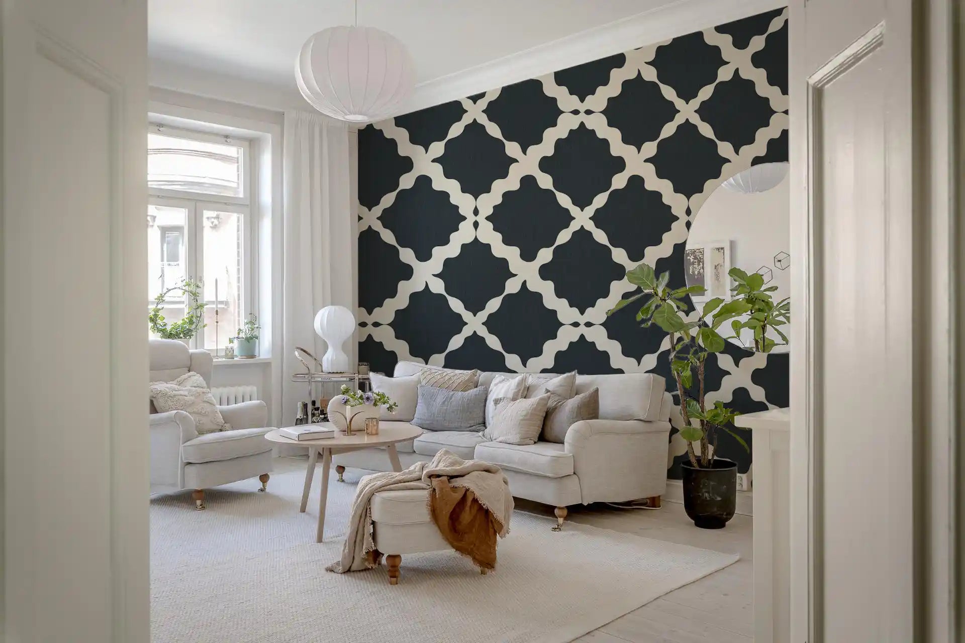 Repeating Moroccan trellis motif on dark charcoal geometric wallpaper.