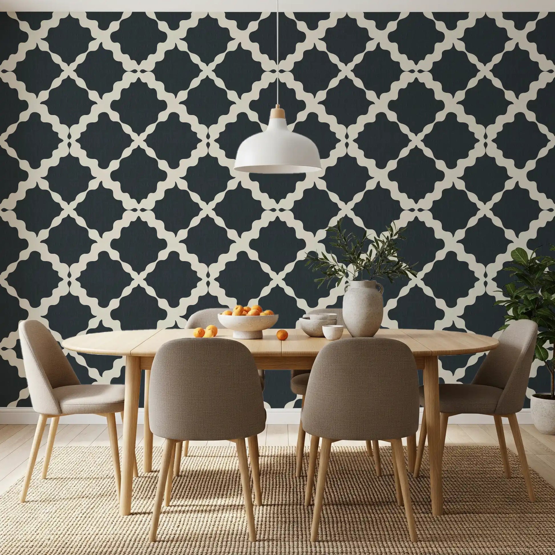 Dining room feature wall with charcoal cream geometric trellis wallpaper. 