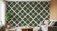 Geometric trellis wallpaper in moss green and cream featured in an living room.