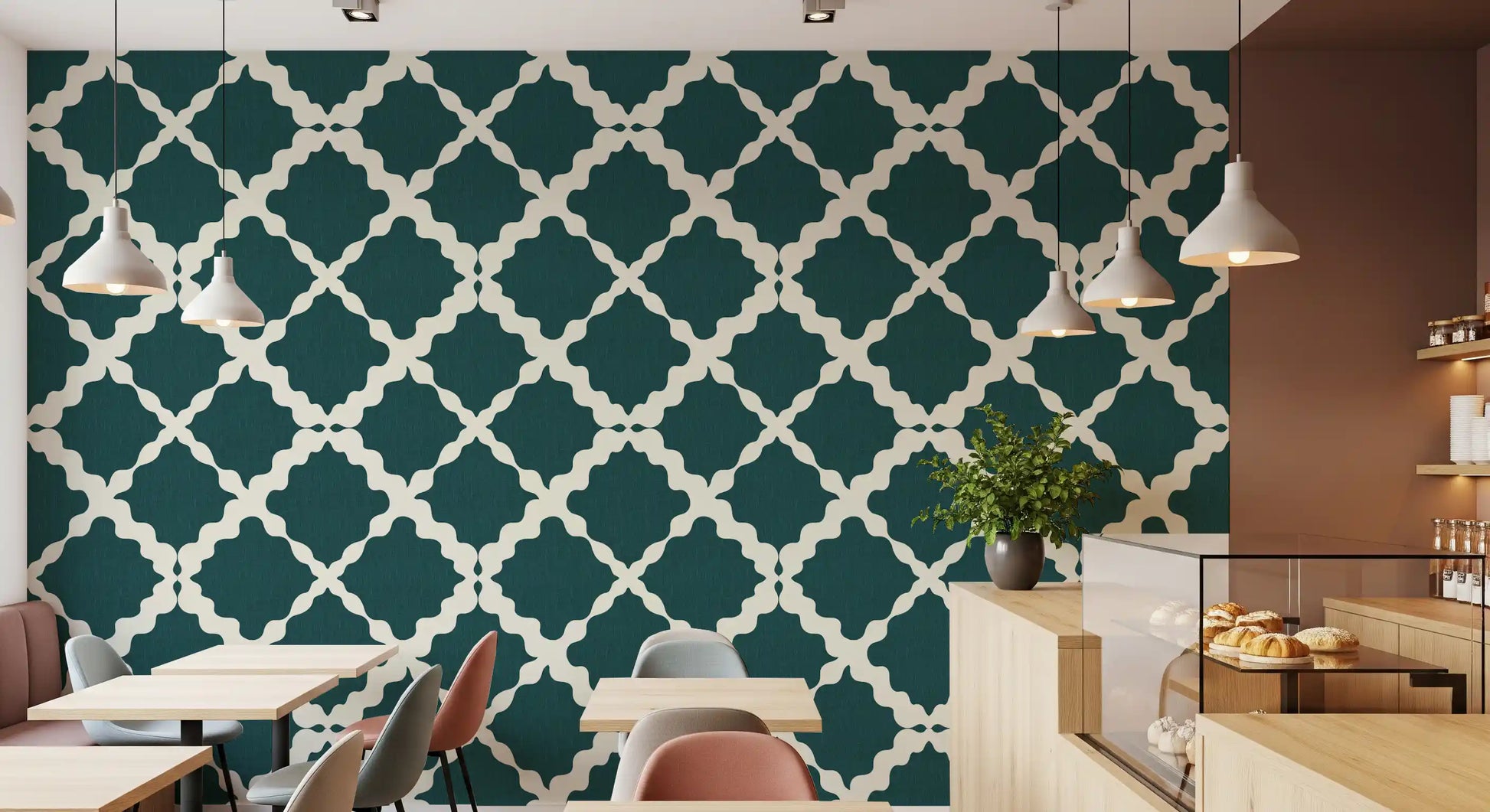 Large-scale cream lattice wallpaper on deep teal textured background for cafe.