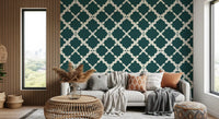 Oversized geometric trellis wallpaper in deep teal with cream lattice design.