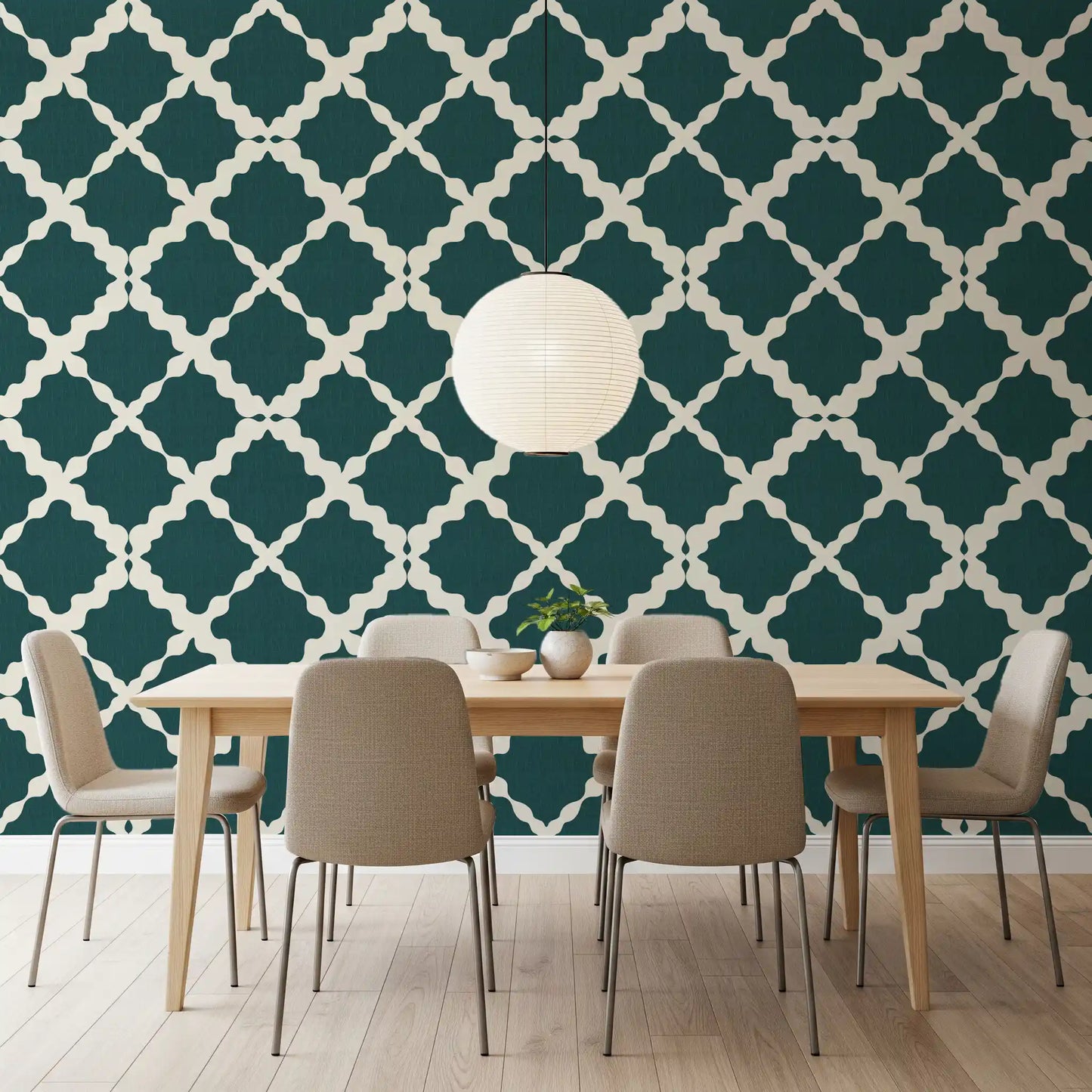 Dining room feature wall with cream and teal trellis geometric wallpaper.