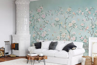 Botanical chinoiserie mural on hallway wall with pastel peony and bird design.