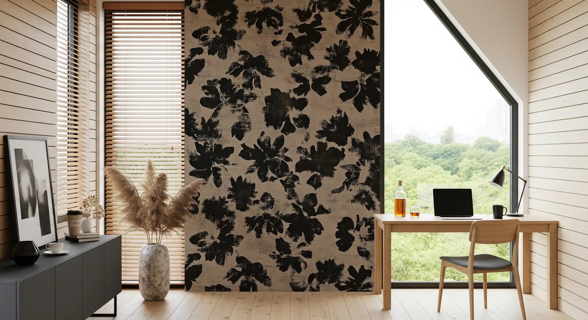 Study space wall with bold black floral silhouette mural on warm beige linen-textured surface