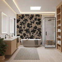 Distressed black floral silhouette repeat pattern on warm beige textured mural.