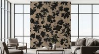 Scattered botanical black silhouettes on sandy linen-effect wall mural surface.