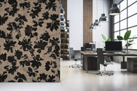 Dark floral silhouette all-over pattern on warm beige textured wall mural.