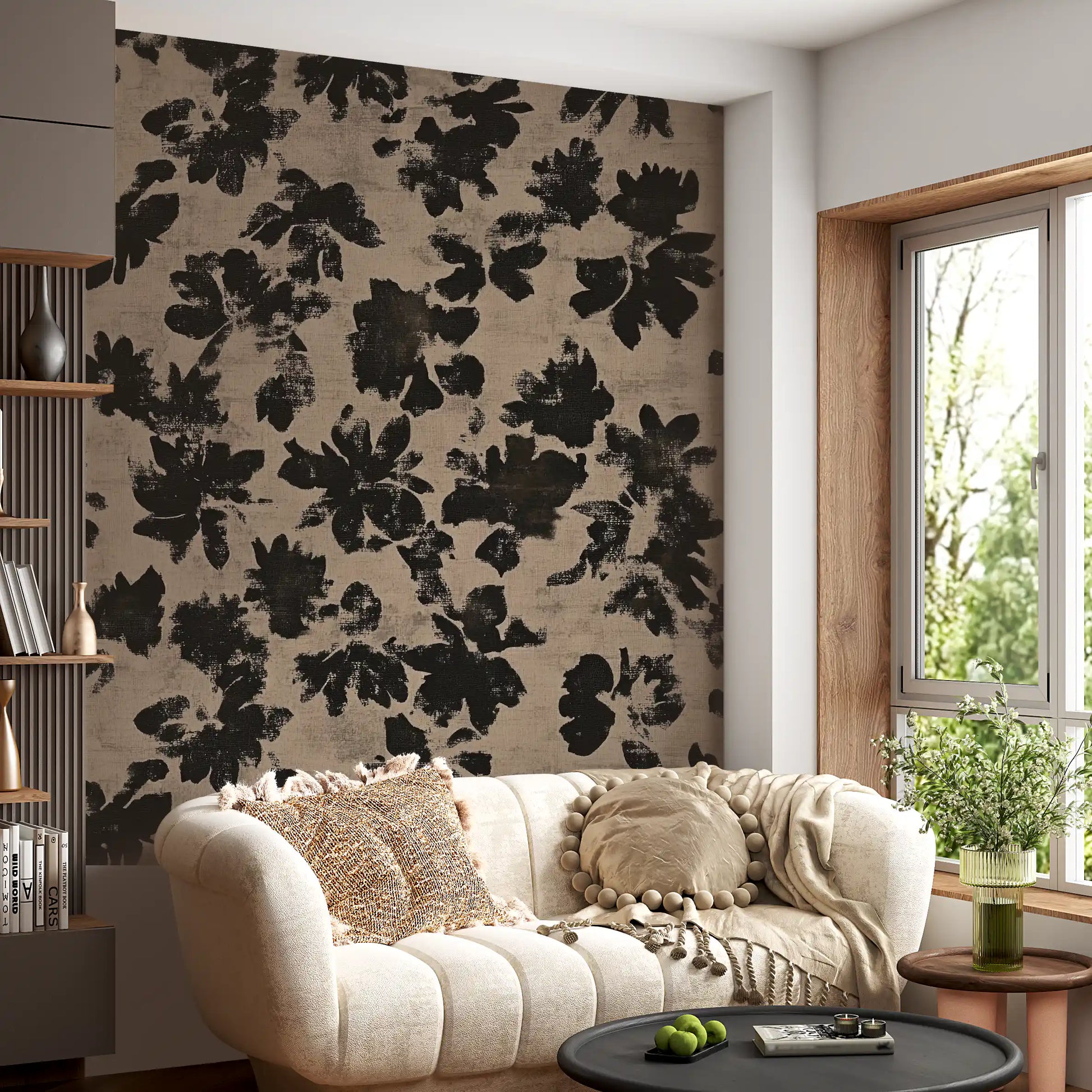 Living room wall covered with distressed black floral silhouette mural in beige. 