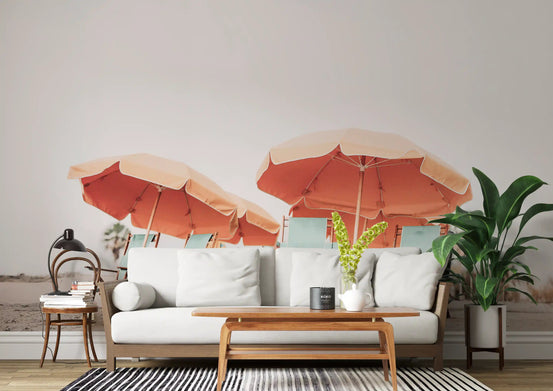 Living room beach mural with coral umbrellas and seafoam tones on sandy shore., GD9789