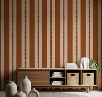 Retro stripe wallpaper in a hallway with rust and cream tones., GD9791