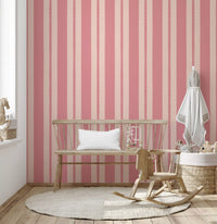 Two-tone stripe wallpaper with circular scallop trim in muted pink shades.