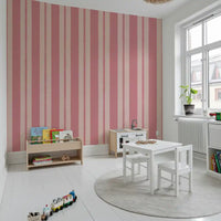 Blush scallop stripe wallpaper with circular repeat pattern in kids playroom.