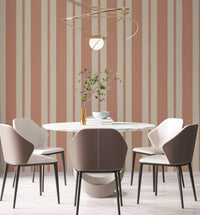 Vertical terracotta stripe wallpaper covering a dining room wall.