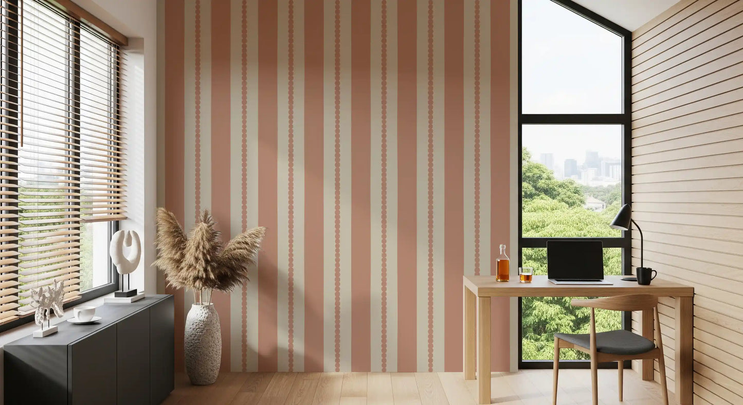 Warm sand and terracotta striped wallpaper on a study room accent wall.