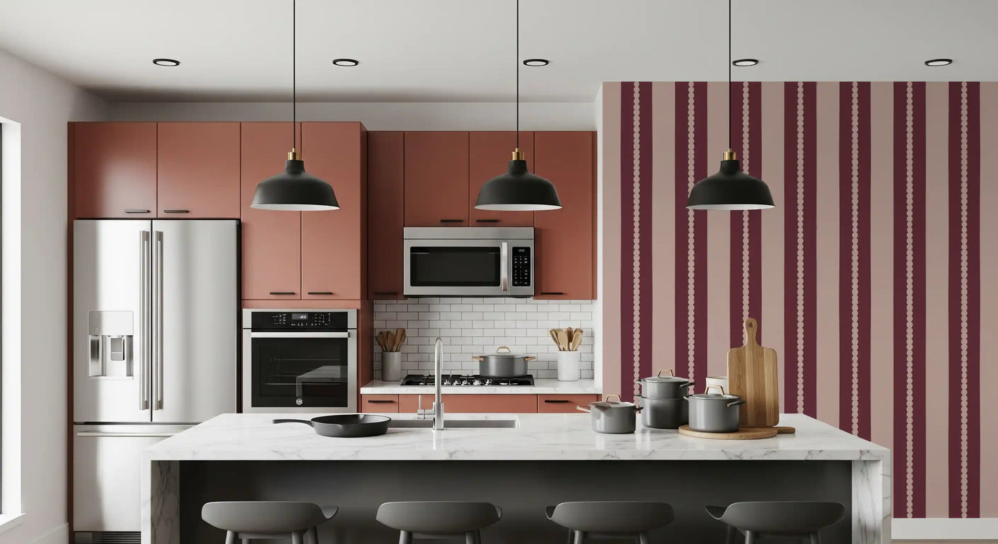 Blush and berry vertical stripe wallpaper with scalloped border details.
