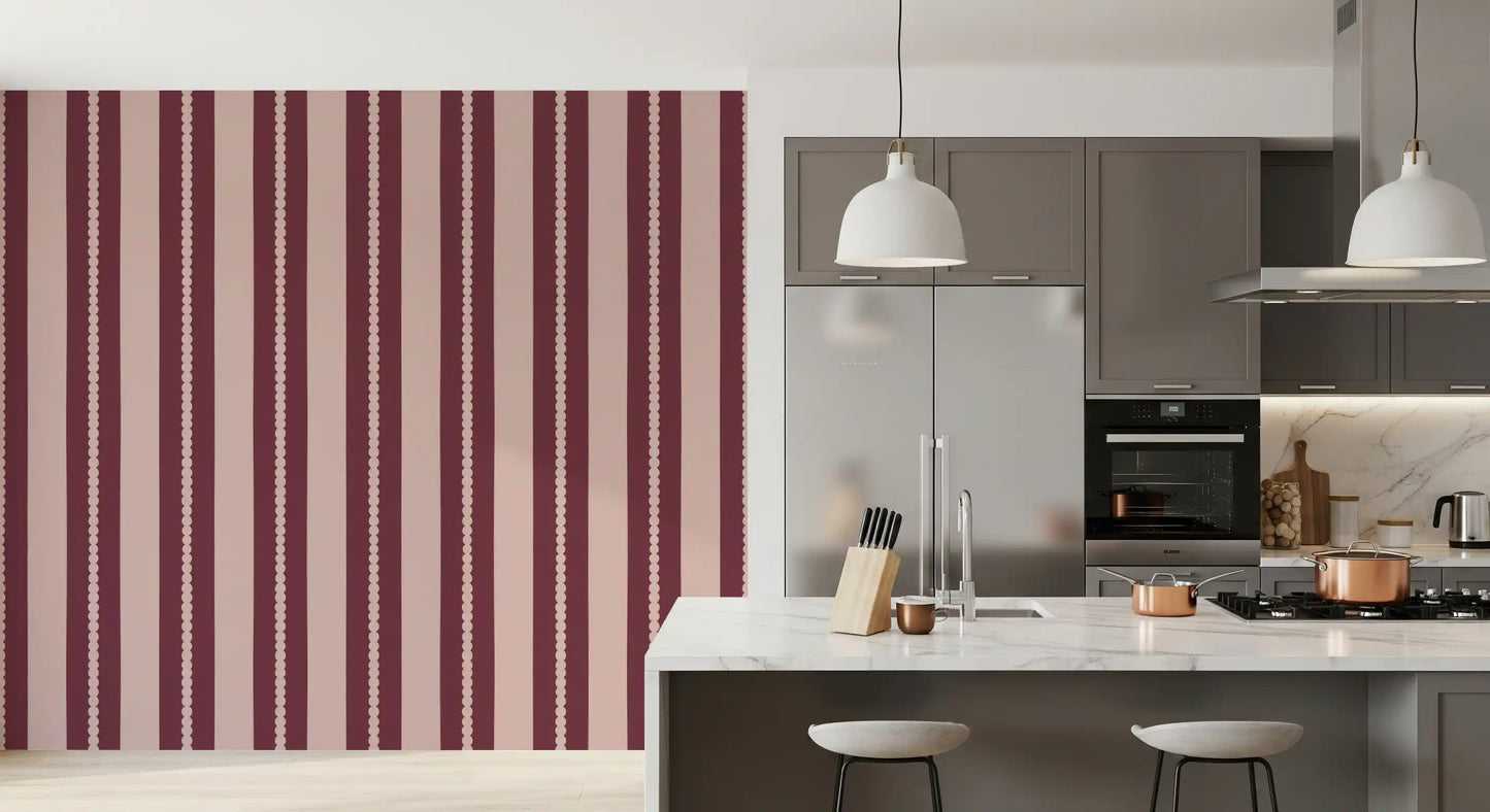 circular dot motif on blush and berry scallop stripe wallpaper in kitchen.