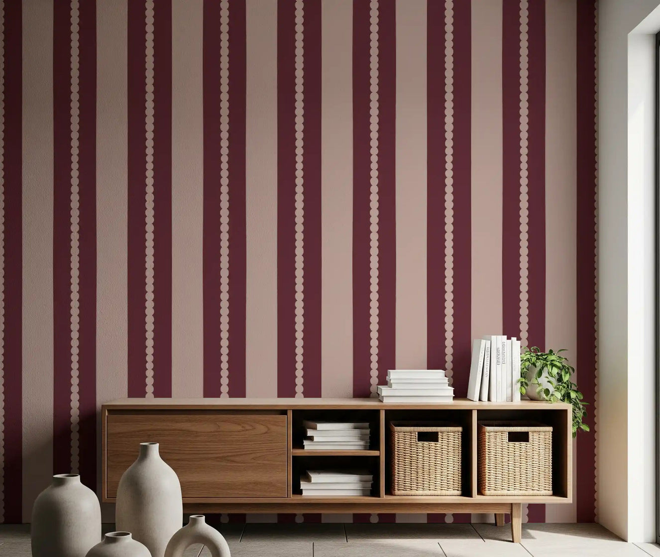 Hallway wall with scallop stripe wallpaper in blush and berry.