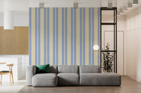 Blue scalloped stripe wallpaper in a living room interiors.