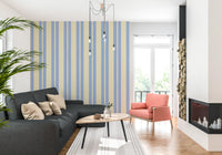 Vertical stripe wallpaper with scalloped detail in blue and cream.