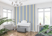 Periwinkle blue stripe wallpaper with cream scalloped border and dot accent.