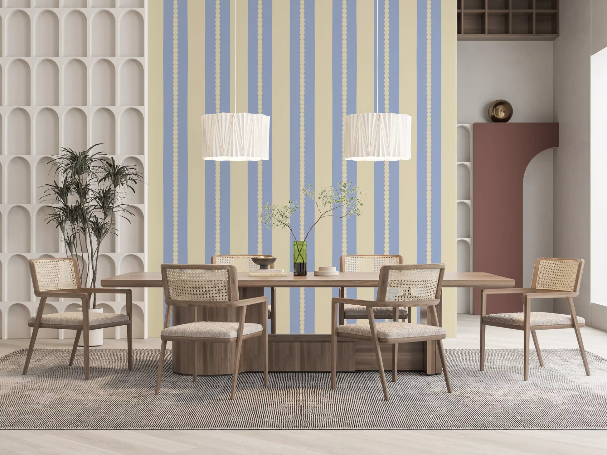 Cream vertical stripes with scalloped wavy edges on a blue striped wallpaper.