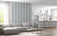 Scalloped Sky Stripes Wallpaper in soft periwinkle blue and cream vertical pattern.