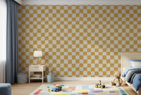 Bedroom accent wall with golden wavy checks wallpaper in cream and tan tones