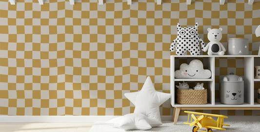 Kids room wall with golden wavy checkerboard wallpaper in tan and cream.