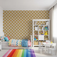 Child's bedroom wall featuring golden ripple checks peel and stick wallpaper. 