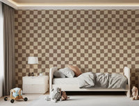 Wavy geometric check wallpaper in cream and taupe for kids bedroom.