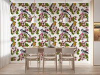 Dining area wall featuring bird and floral blossom repeat pattern wallpaper.
