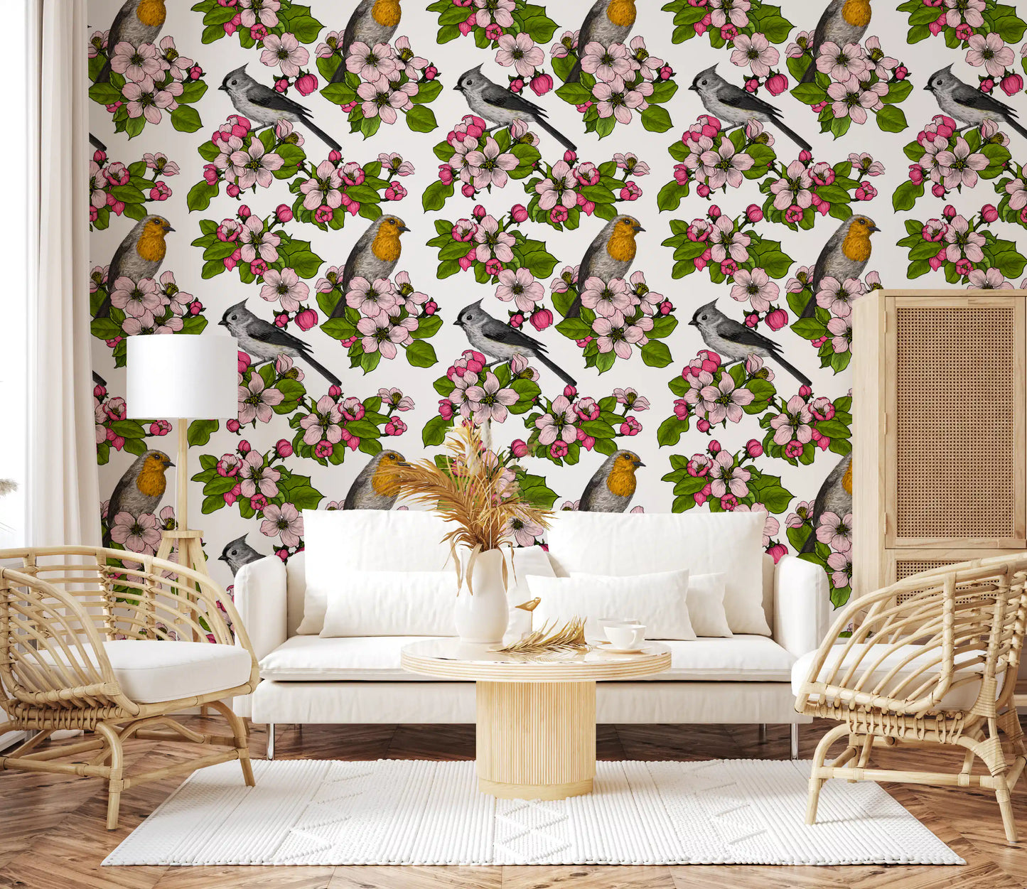 Birds and blossoms repeat pattern wallpaper with pink flowers on white.