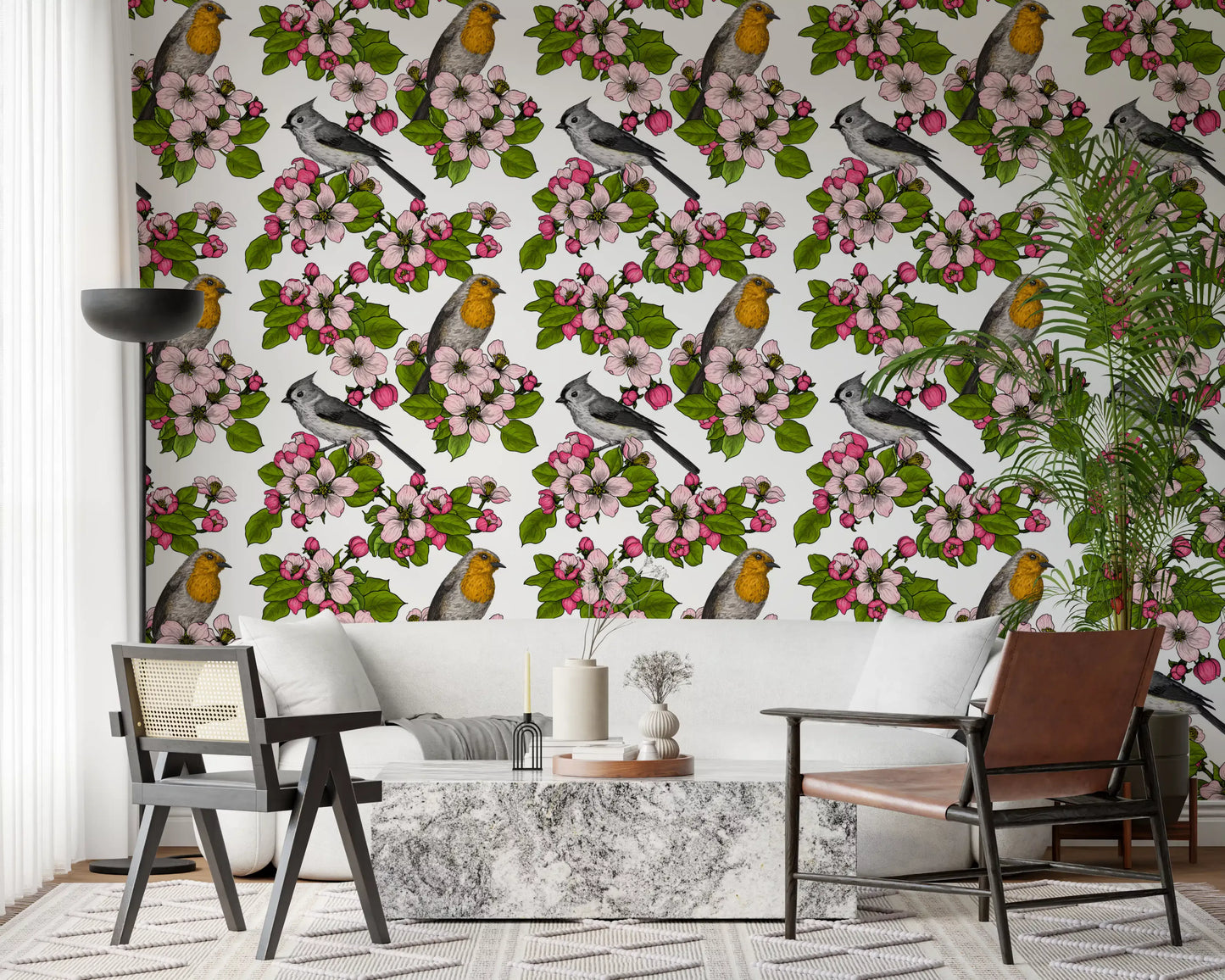 Living room wall with pink floral bird pattern on white base wallpaper.