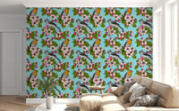 Living room wall covered in birds and pink blossoms floral pattern wallpaper.