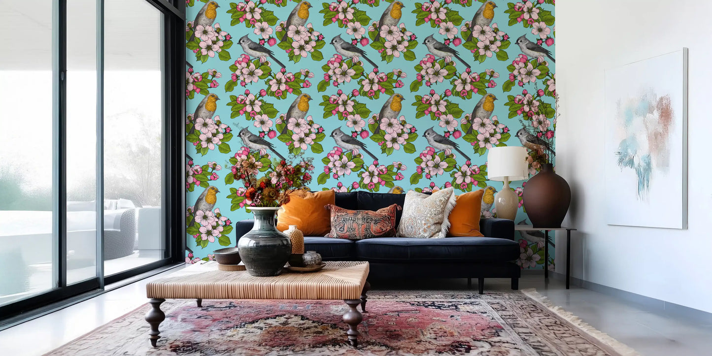 Living room wall with spring birds and blossoms botanical wallpaper in blue.