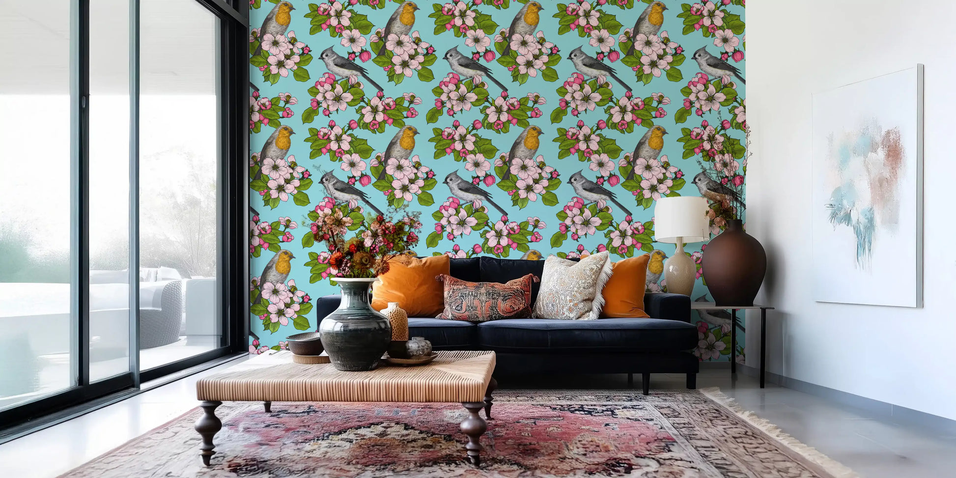 Living room wall with spring birds and blossoms botanical wallpaper in blue.