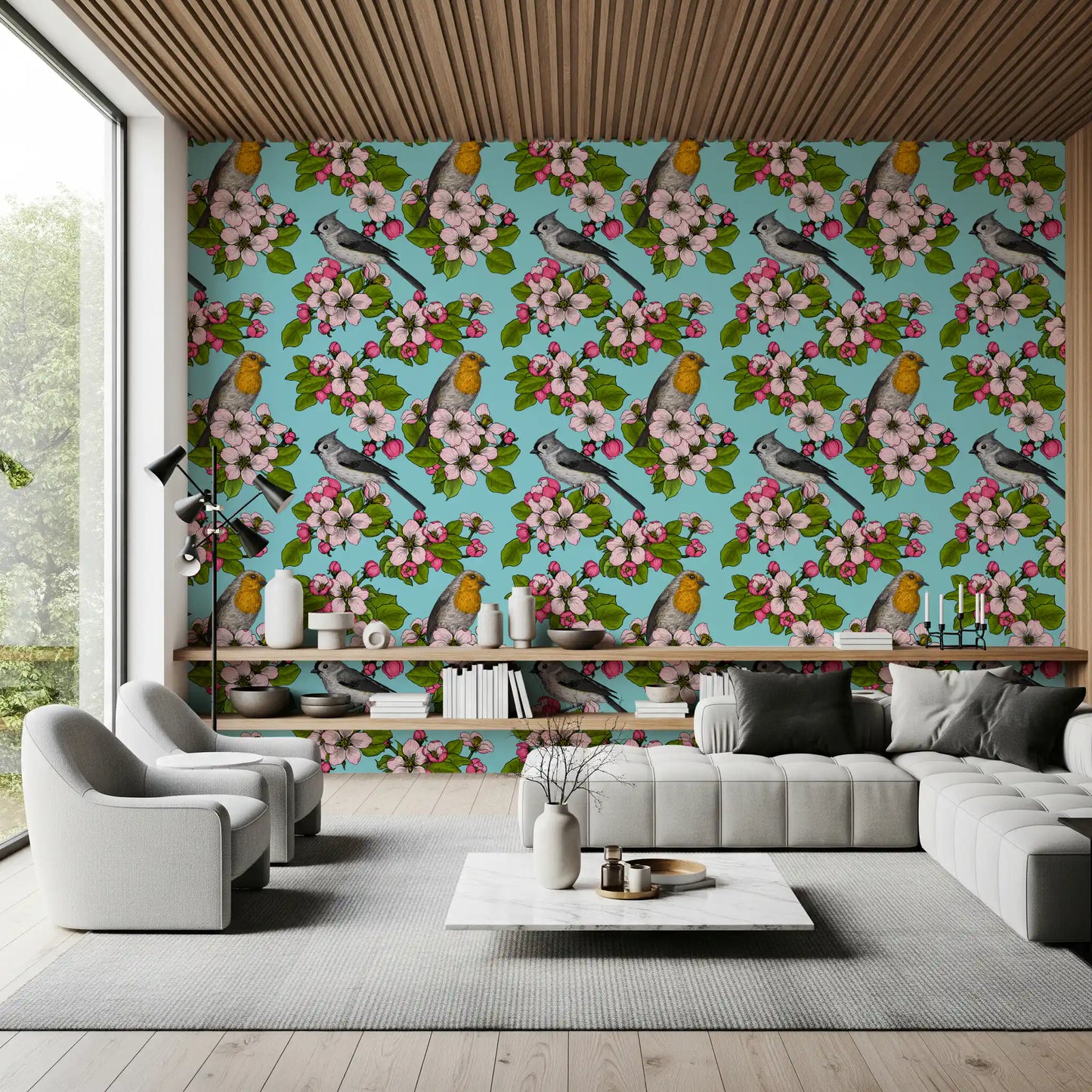 Pink cherry blossom buds and open blooms with green leaves on birds and blossoms wallpaper. 